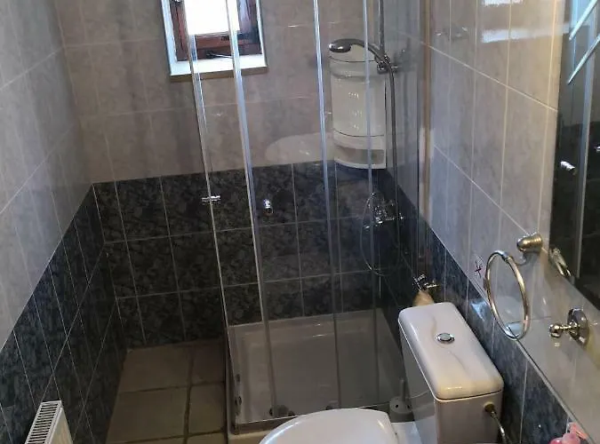 Апартаменты Spanos House *